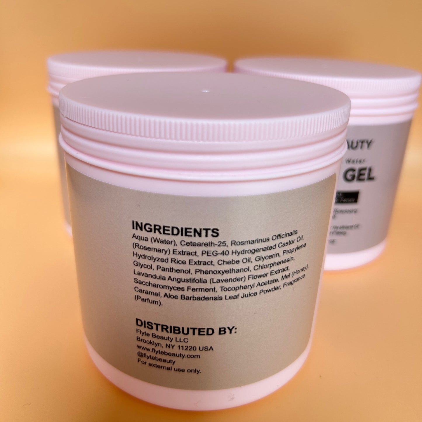 Container with a list of ingredients on an orange background