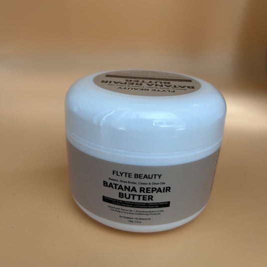 Jar of Flyte Beauty Batana Repair Butter on a beige background