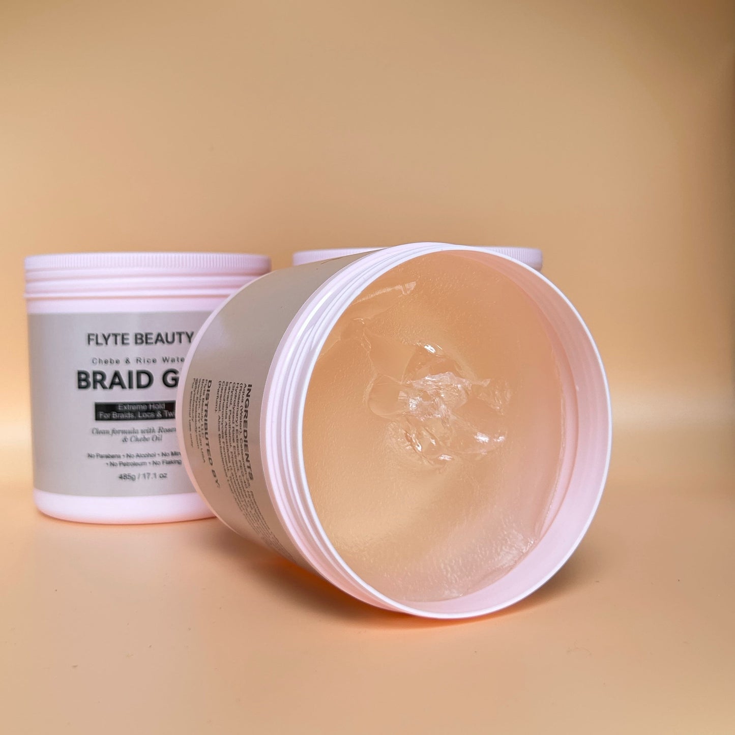 Flyte Beauty Braid Gel container on a beige background